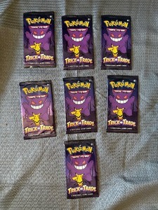 Lot of 7 sealed packs of Pokemon trick or trade cards