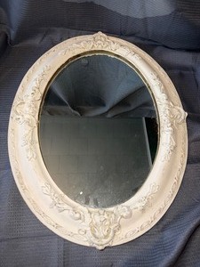 Antique ornate oval wall mirror