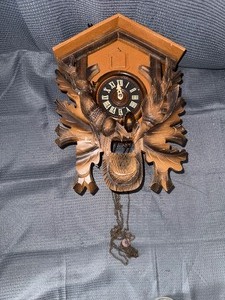 Vintage German Black Forest hunting themed cuckoo clock