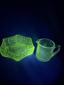 Lot of two starburst glass items that GLOW