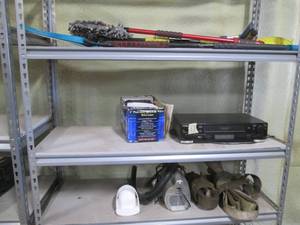 Contents of shelf including tie dow...