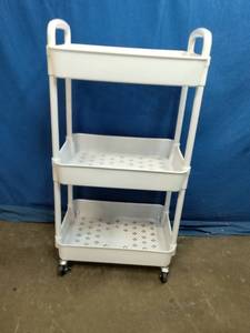 White 3-tier rolling utility cart with a perforated tray design