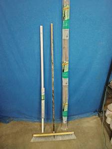 Push Broom,  Vigoro Sturdy Bamboo Plant Stakes pack, and a Cord Hiding Track