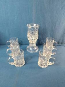 This set resembles Waterford Lismore crystal Irish coffee mugs and a matching hurricane candle holder