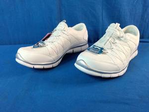 Brand New  Skechers Womens Gratis-Strolling sneakers in white with silver accents. Size 8.5