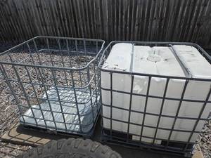 IBC Tote in Steel Cage - Damaged Top Deck with Large Hole