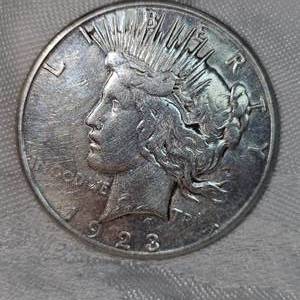 1923s Peace Dollar $1-XF