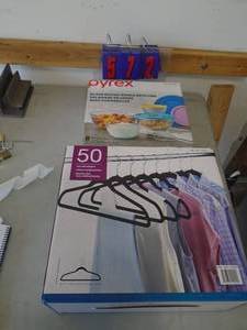 Pyrex set with box of hangers. As shown. CASH ON SITE ONLY. PICKUP IS TUESDAY MAY 19TH FROM 11 AM TO 4 PM. REGARDLESS WHAT THE SCHEDULE STATES.