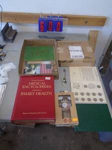 Flat with misc literature & collection coin book. As shown. CASH ON SITE ONLY. PICKUP IS TUESDAY MAY 19TH FROM 11 AM TO 4 PM. REGARDLESS WHAT THE SCHEDULE STATES.