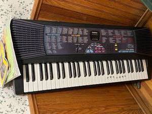 Casio CTK-555L Key Lighting Keyboard (untested) with Books & Manuals