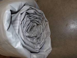 Large Tarp Good for Woodpile may have holes or rips