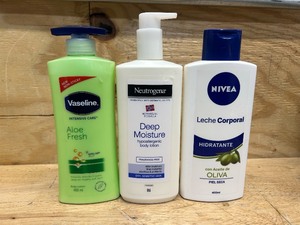 Vaseline Intensive Care Aloe Fresh, Neutrogena Norwegian Formula Deep Moisture, and NIVEA Leche Corporal Hidratante body lotions (lot of 3)