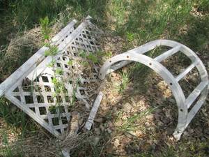 White plastic outdoor garden archwa...