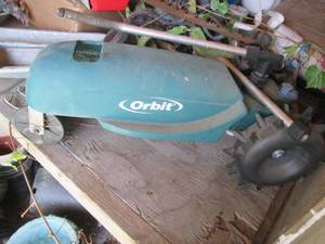 Metal Orbit hose walking sprinkler...