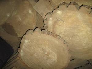 Stack of 6 round bark-on wood slabs a...