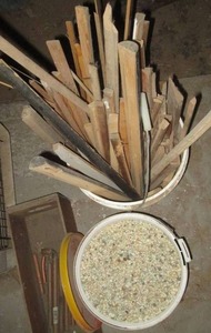 Bucket of wood strips and trim, woo...