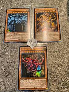 Obelisk the Tormentor, The Winged Dragon of Ra, Slifer the Sky Dragon- Set of 3 Yu-Gi-Oh cards