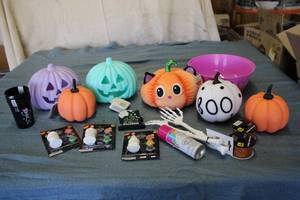 Box of halloween decorations and cr...