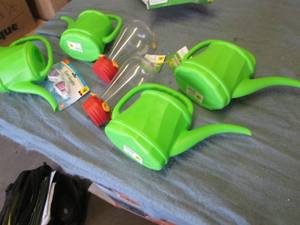 Hummingbird feeders and watering ca...