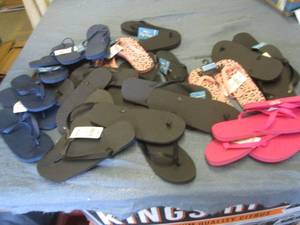 Lot of assorted flip flops...