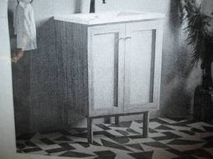 Bathroom vanity in oak color...