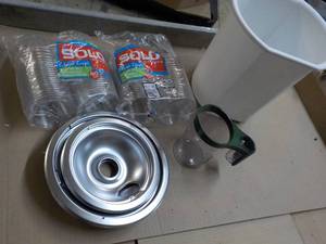 Solo Cups and more in a wastebasket...