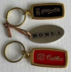 (3) Vintage Automotive Promotional Keychains - Cadillac, Oldsmobile, Honda