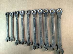These are Husky ratcheting combination wrenches featuring a 12-point design for versatile use.