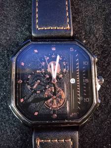 Brand New Yolako chronograph quartz watch featuring a black leather strap and a black dial