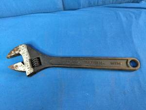 This is a vintage Thorsen 18-inch adjustable wrench, model 56738.