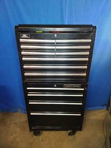 Craftsman black steel rolling tool cabinet and Husky Upper Cabinet full of tools
