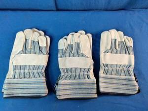 These are striped leather palm work gloves with extended safety cuffs. Three Pairs