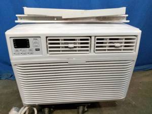 TCL window air conditioner, 12,000 BTU , featuring digital controls and adjustable vents. With Remote Control