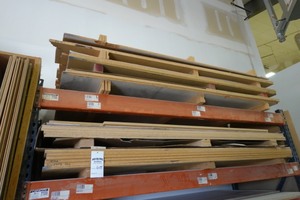 (2) 4x8 sheets 0.75 inch WhiteWhite particle board, (5) 4x8 sheets 0.75 inch CherryCherry particle board, (6) 4x8 sheets 0.75 inch BlackBlack Melamine, (1) 4x8 sheet 0.75 inch Red OakMaple Melamine, misc Quarter sawn (Pallet rack is not included)