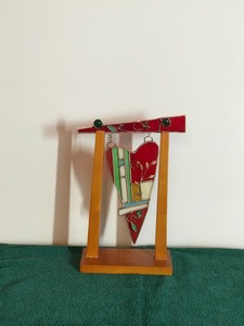Decorative Stained Glass Piece Hanging on Piece of Wood - Glass is Shaped like a Heart