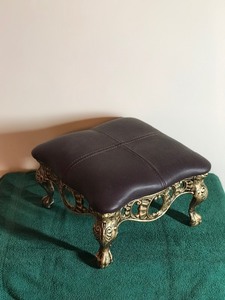 Cast Iron Upholstery Foot Stool with Bird Clawed Feet Over Ball