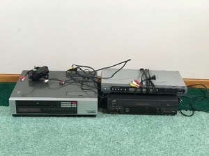 Quasar VHS Recorder and Player  JVC VHS Player  Magnavox DVD player