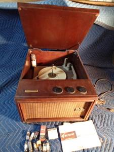 Vintage Motorola tube stereo record player with extra tubes