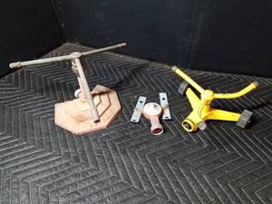 3 Vintage water sprinklers
