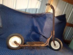 1930s or 40s metal scooter with solid rubber tires