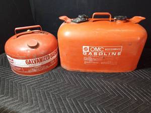 2) 2 12 gal gas cans and 5 gal. OMC gas can, boat gas tank