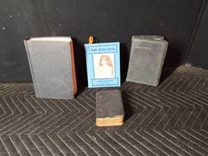 3 Holy bibles and a Little Holding hands book