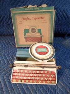 Vintage Simplex lithographed tin toy typewriter