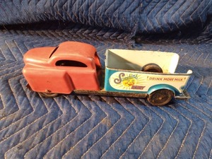 Vintage Wyandette pressed steel and tin Sunshine Dairy milk truck toy with tin wheels