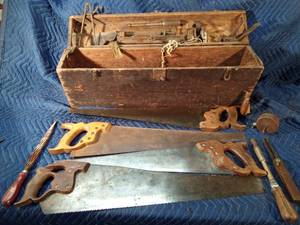 Vintage wood box with vintage tools saws, files, hatchet head, chalk liner and more