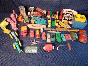Lot of vintage metal and plastic toys
