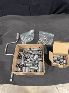 Assorted Sockets and Crank Handle