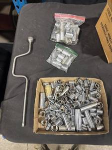 Assorted Sockets and Crank Handle