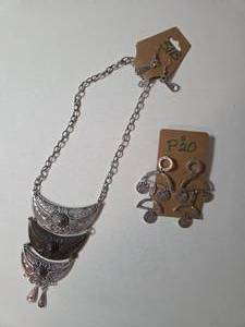 Necklace and Earrings.&nbsp Shades of silver and gray.