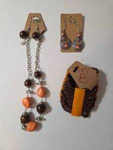 Necklace , Earrings, Bracelet.&nbsp Shades of orange and brown.